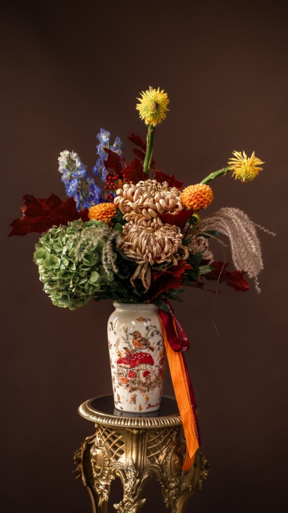 Green hydrangea with orange pompon chrysanthemums and yellow ball dahlias