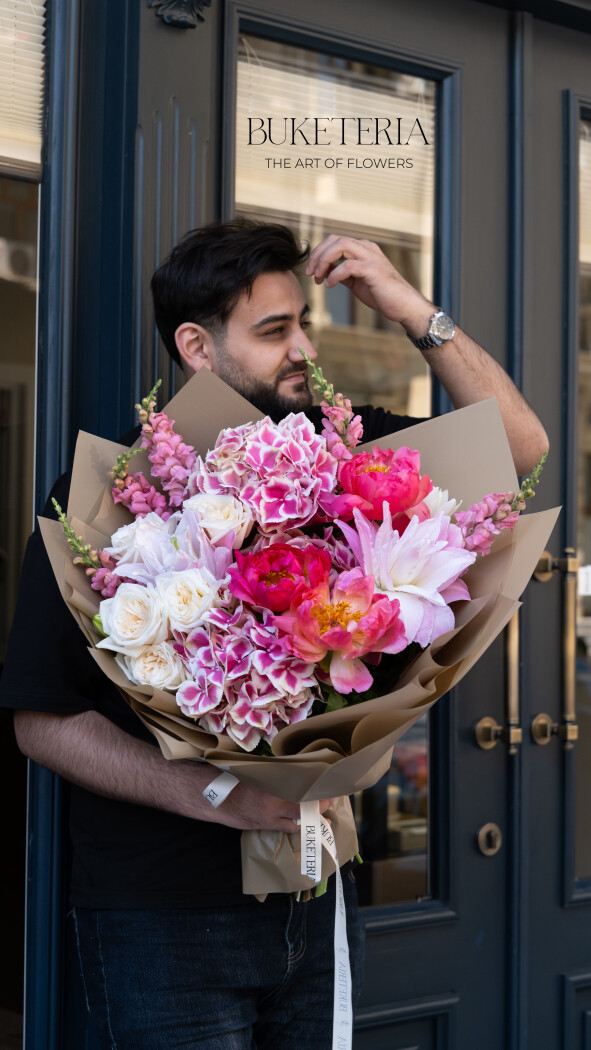 Three pink hydrangeas with pink peonies and cream garden roses