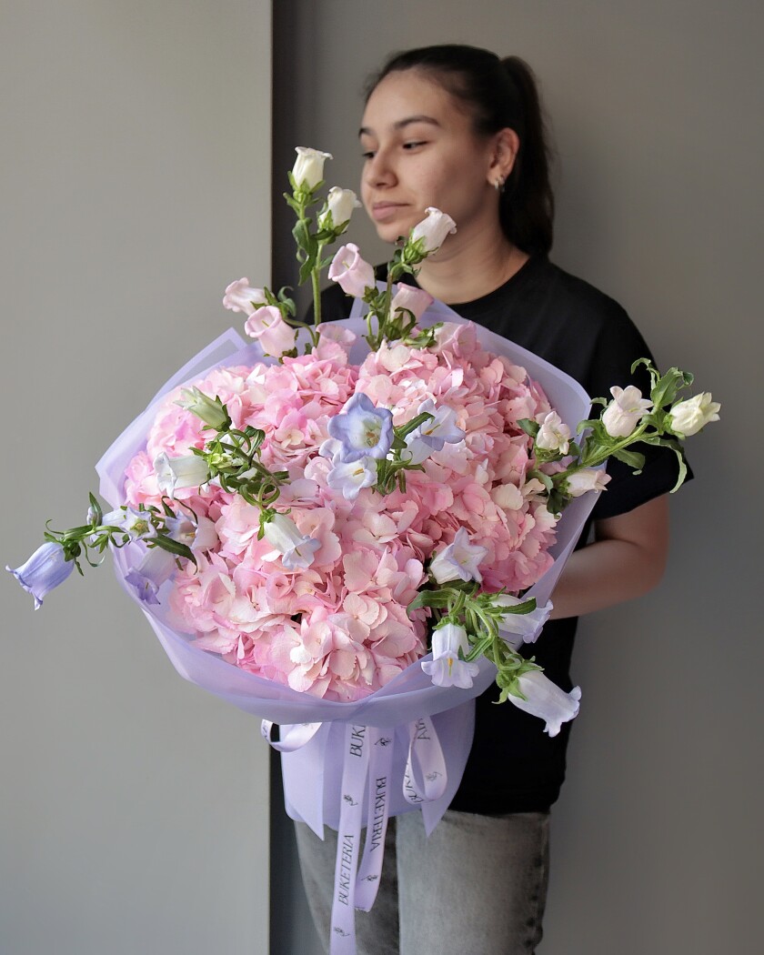 Pink hydrangeas with light blue campanulas