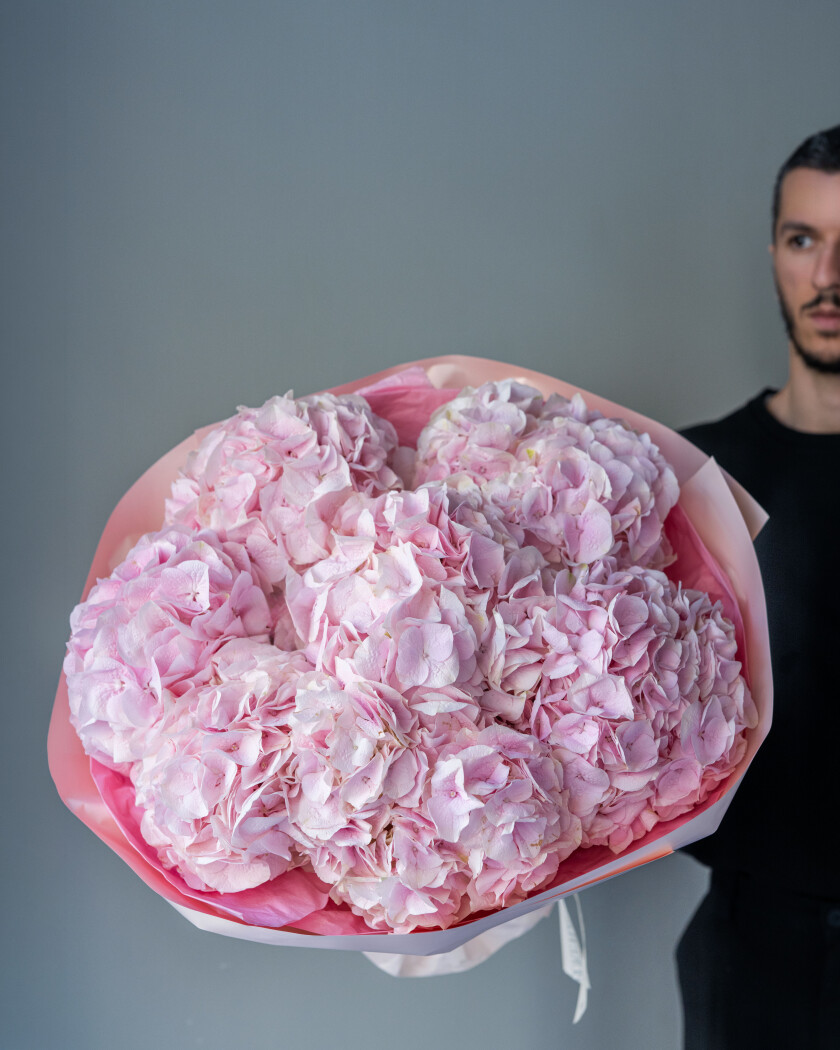 Seven pink hydrangeas in waterproof paper