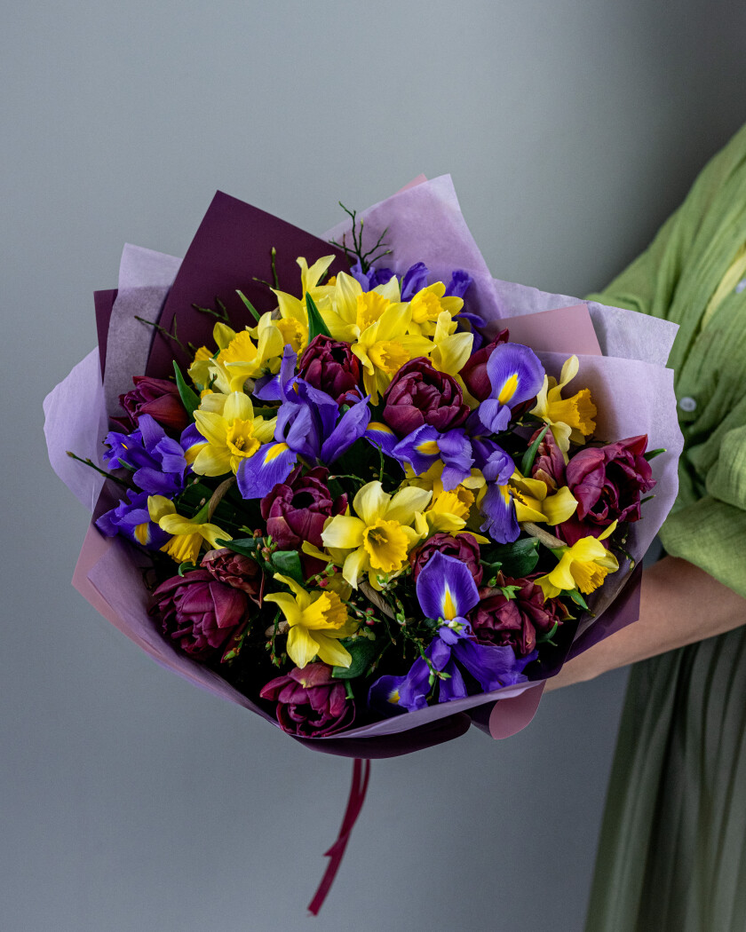 Burgundy tulips with purple dutch irises and yellow narcissus