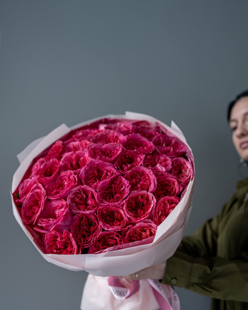 Mono bouquet of hot pink garden roses
