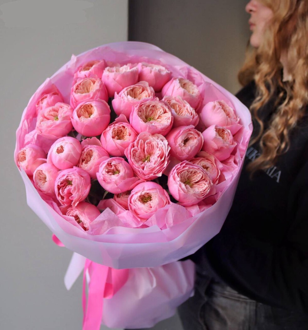 Nine light pink spray roses in waterproof paper