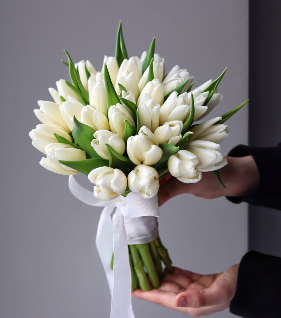 Thirty-one white tulips in a classic hand-tied bouquet