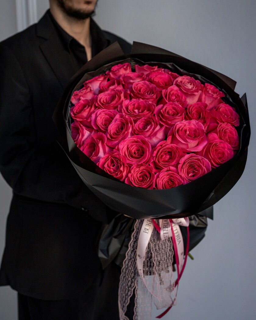 Mono bouquet of hot pink garden roses