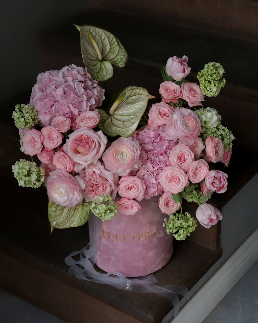 Seven blush spray roses with green viburnum and light green anthurium