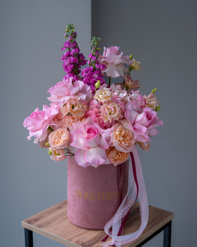 Seven peach lisianthus with light pink garden roses and cream hydrangea