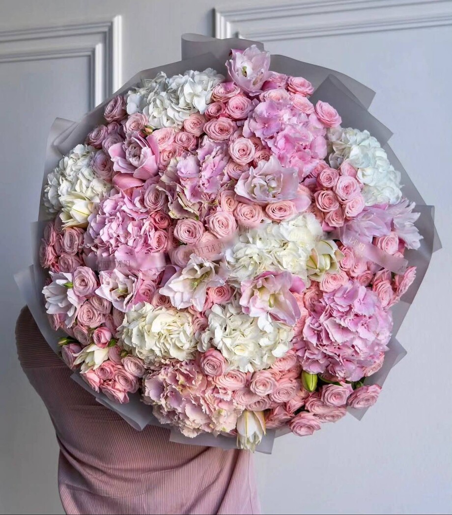 Blush spray roses with pink hydrangeas and light pink lilies
