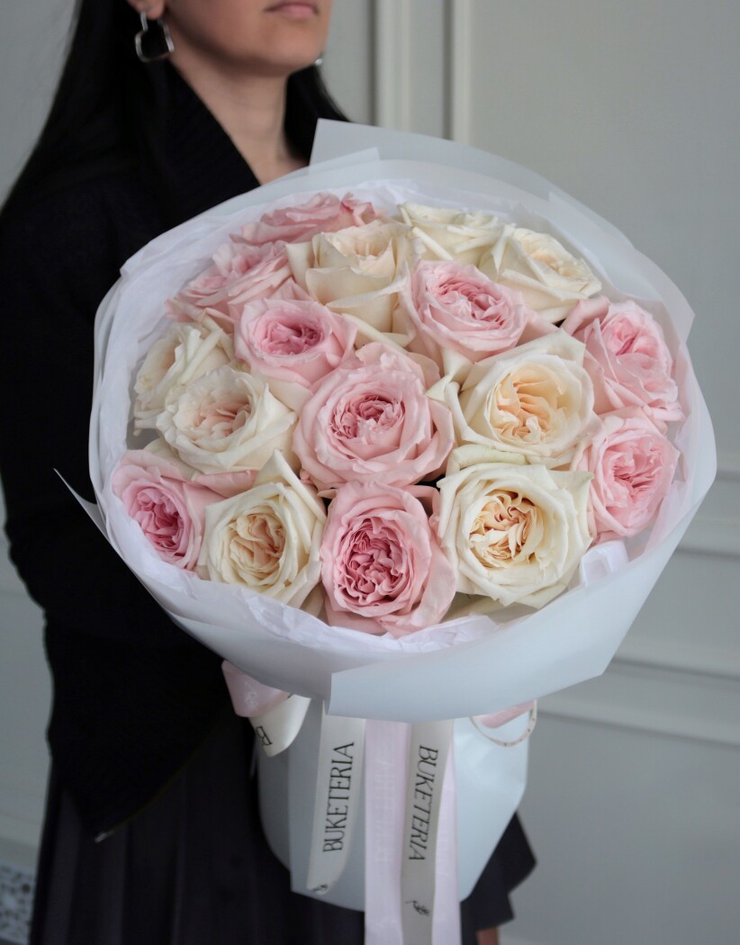Light pink and cream garden roses in waterproof paper