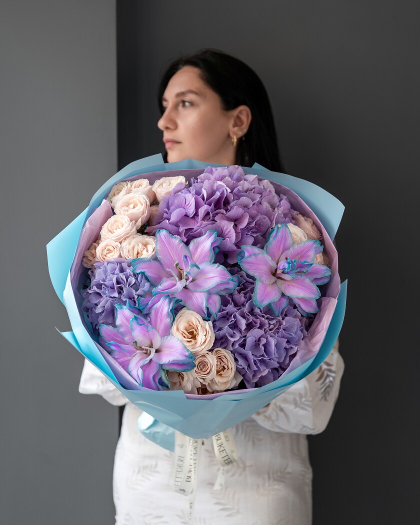 Mixed bouquet of lilac hydrangeas and dusty pink spray roses