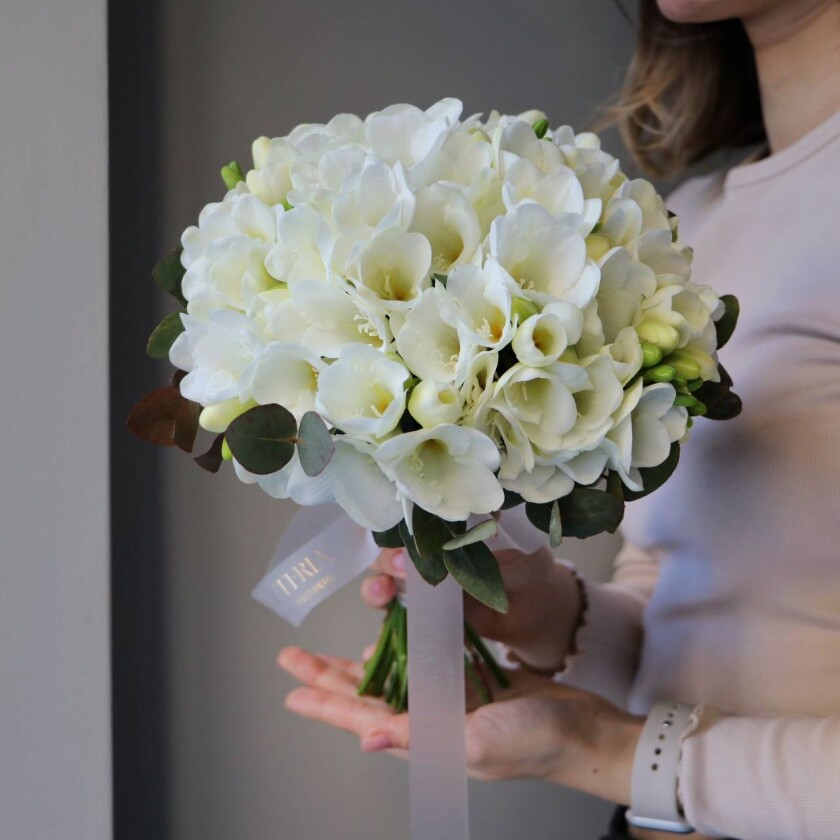Mono bouquet of white freesia