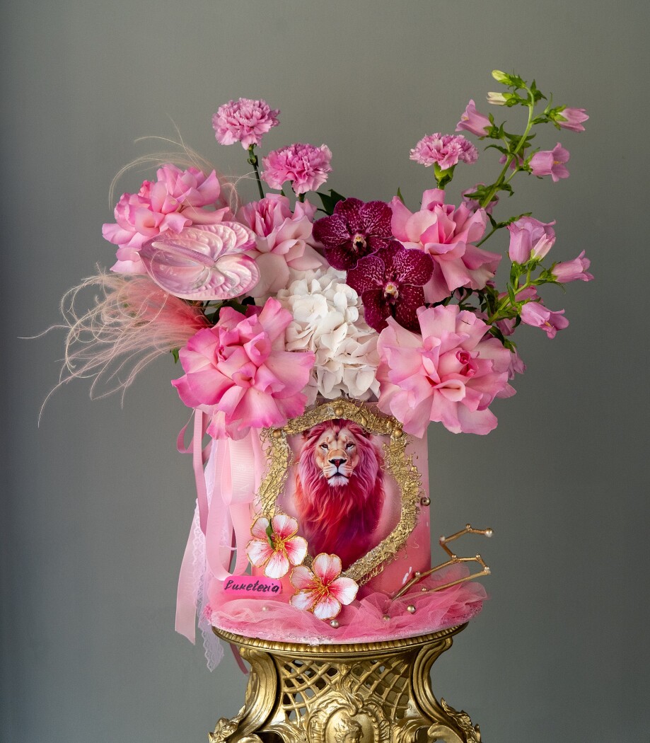 Blush garden roses with white hydrangea and purple orchids