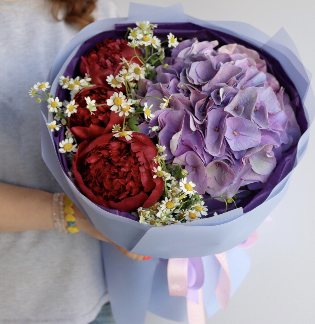 Red peonies with lavender hydrangea